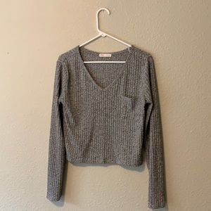 A long sleeve crop top.